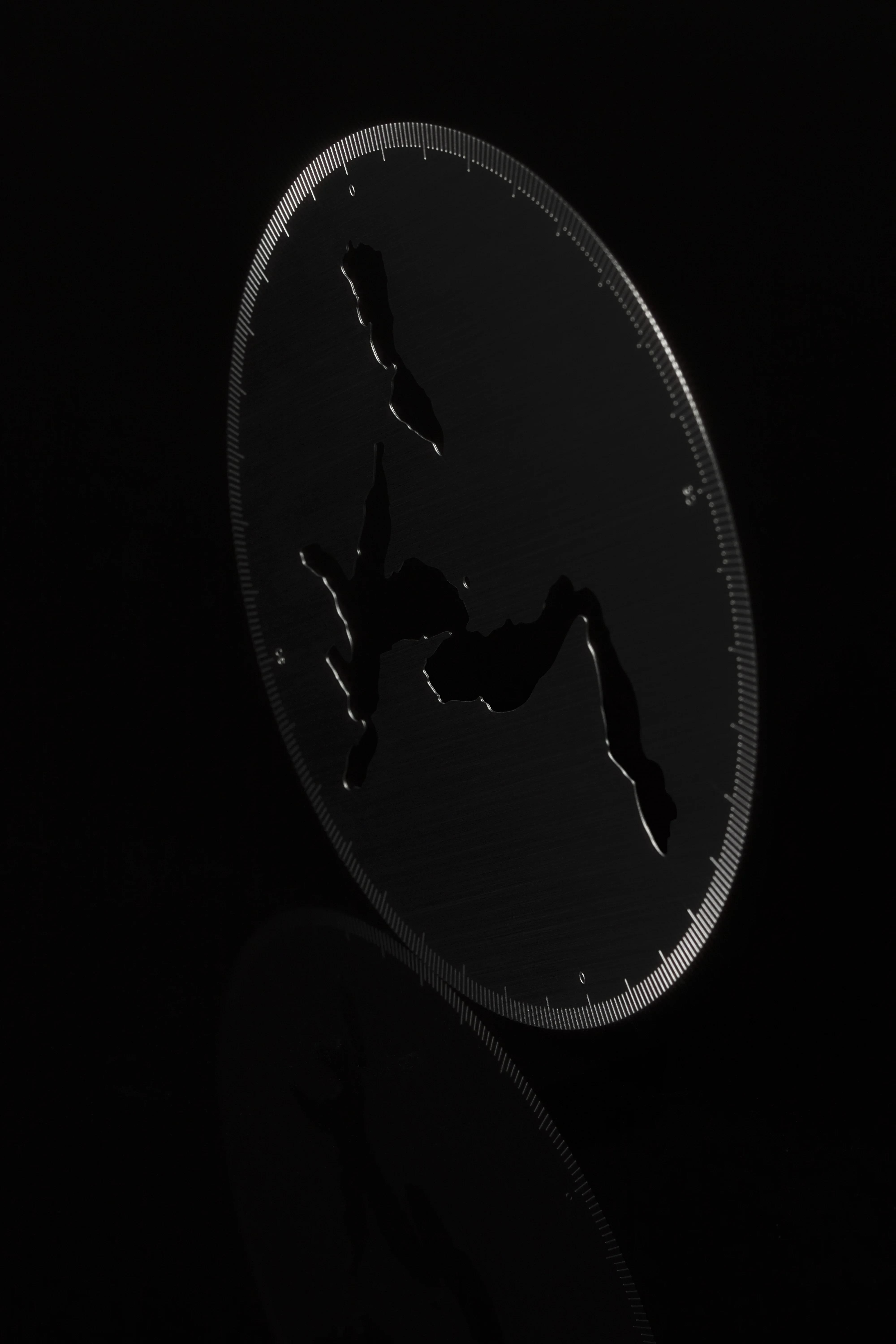 Metal Ruler Capturing Swiss Landscape